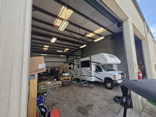Inside the RV workshop Inside the RV workshop at TX RV Repair Shop with a fifth wheel in the service bay